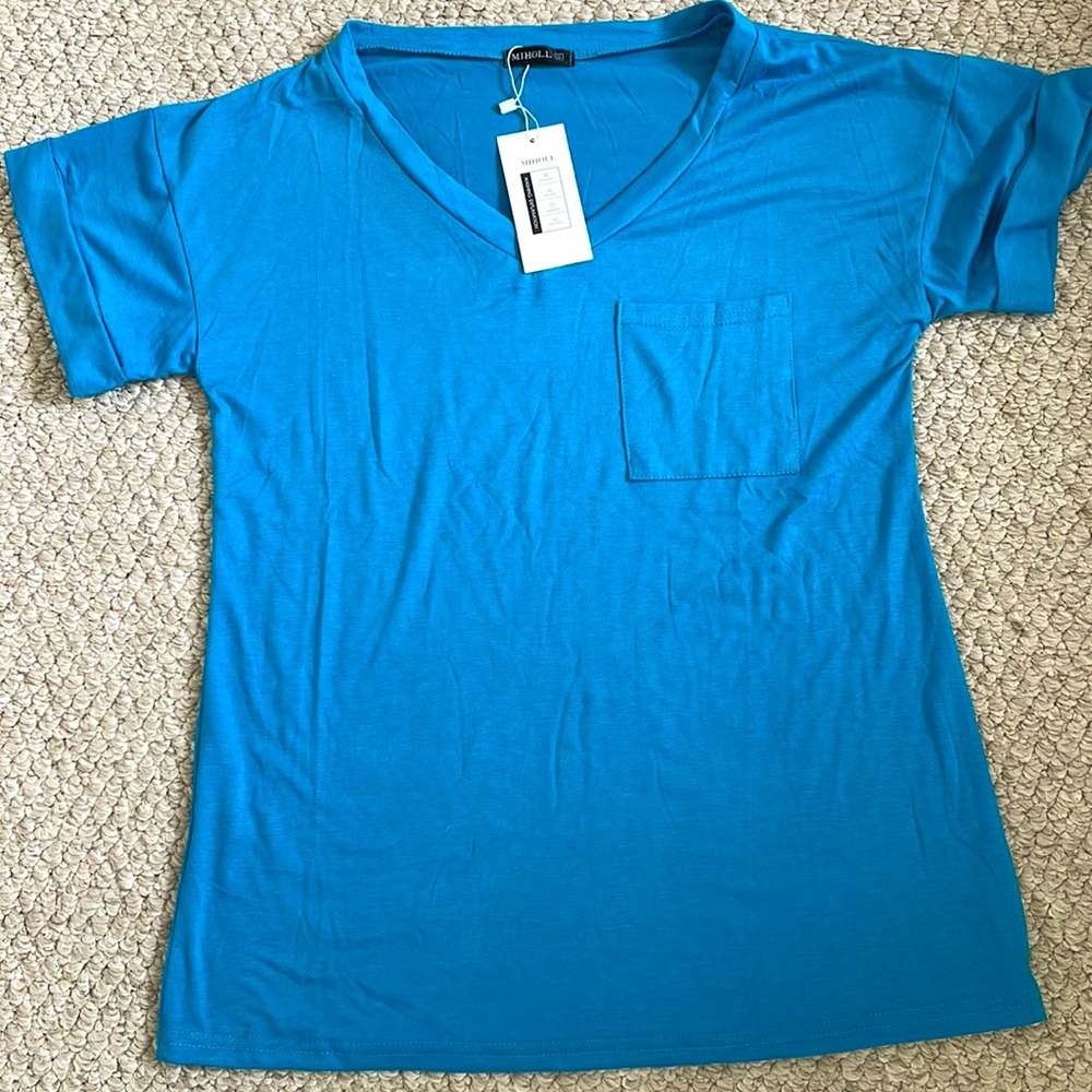 Women’s blue v neck tee shirt. Size small